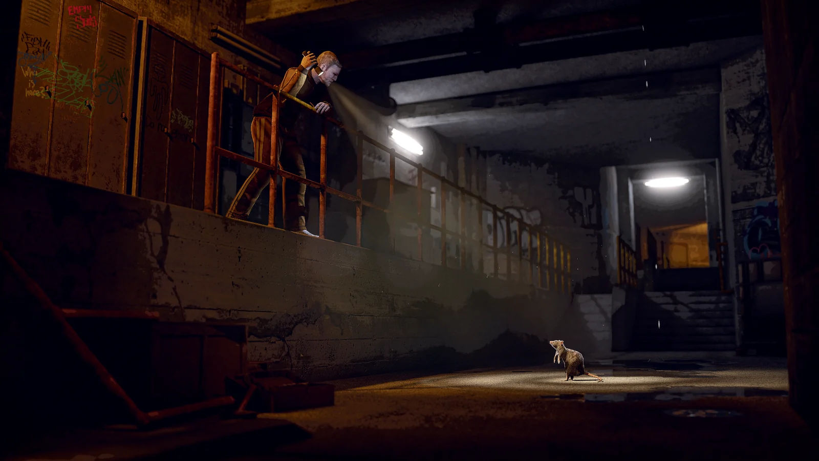 A man shines a flashlight down from a sewer walkway toward a rat.